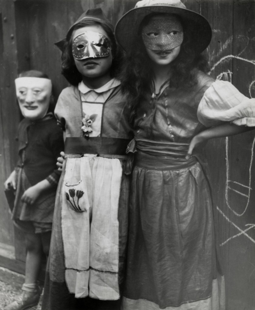 Edmund Teske, Three Children with Halloween Masks, c. 1938-39